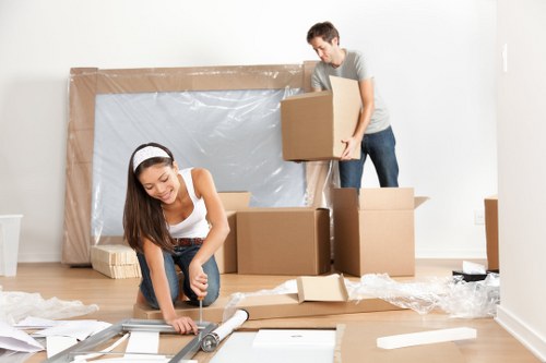Removal team loading furniture for a Kentishtown home move