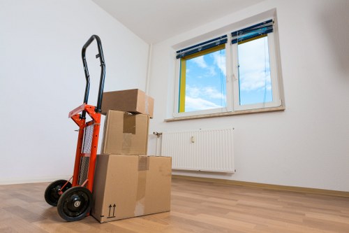 Team loading furniture into a moving van for a Kentishtown move