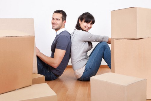 Careful unloading of boxes and furniture near Kentishtown flats