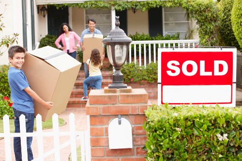 Professional removals team transporting items between properties
