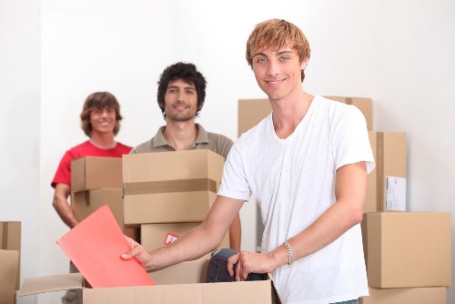 Local removals crew handling flat access in Kentishtown