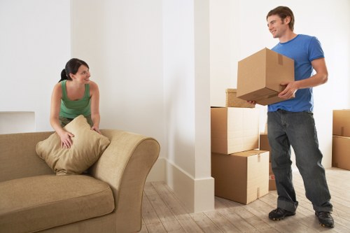 Furniture and boxes being loaded into a moving truck in Kentishtown